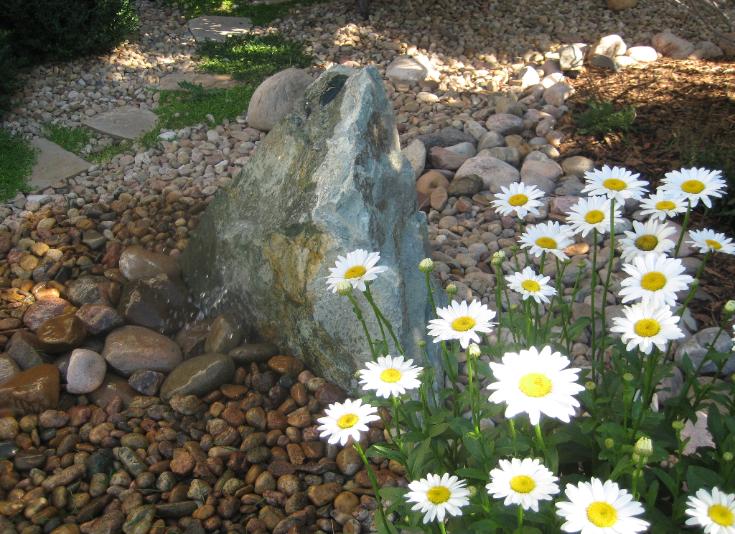 bubbling granite boulder