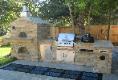 Outdoor kitchen with pizza oven