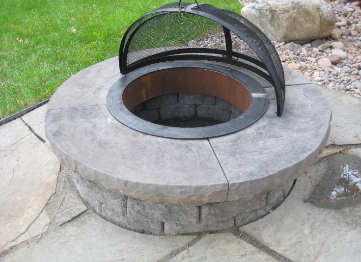 wood burning fit pit with spark screen arrester