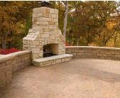 Patio with outdoor fireplace